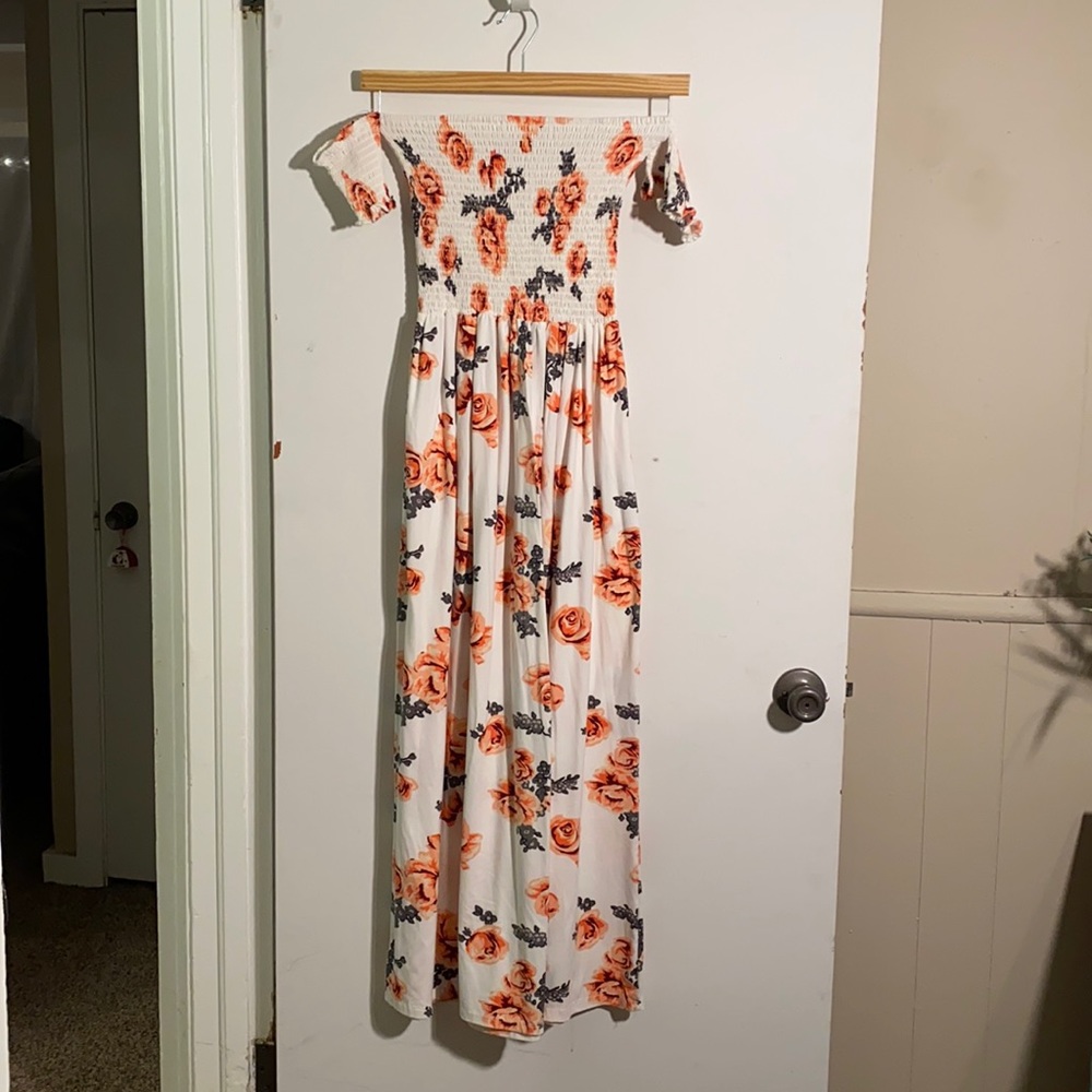 Off the shoulder white floral dress.